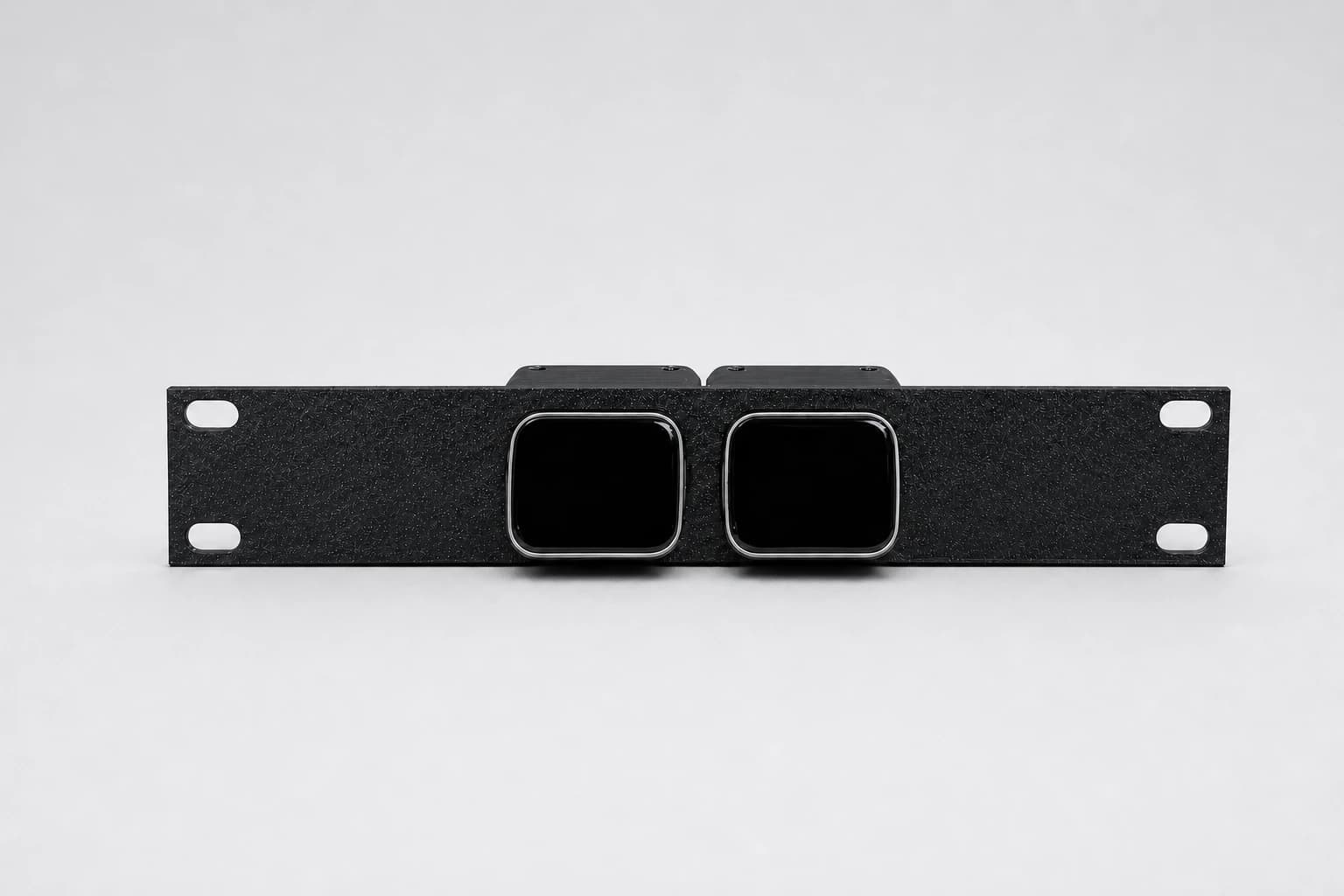 Front studio view of two JetKVM devices installed in the black 1U rack mount for 10-inch racks
